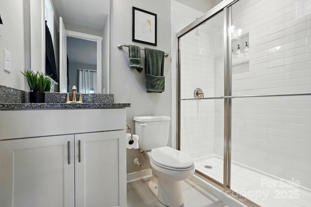 2062 Nellies Way, Fort Mill, SC 29715 - full bath featuring a shower stall, toilet, baseboards, and vanity