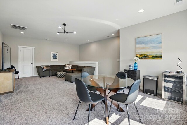 2062 Nellies Way, Fort Mill, SC 29715 - dining room with carpet flooring, recessed lighting, wine cooler, a chandelier, and baseboards