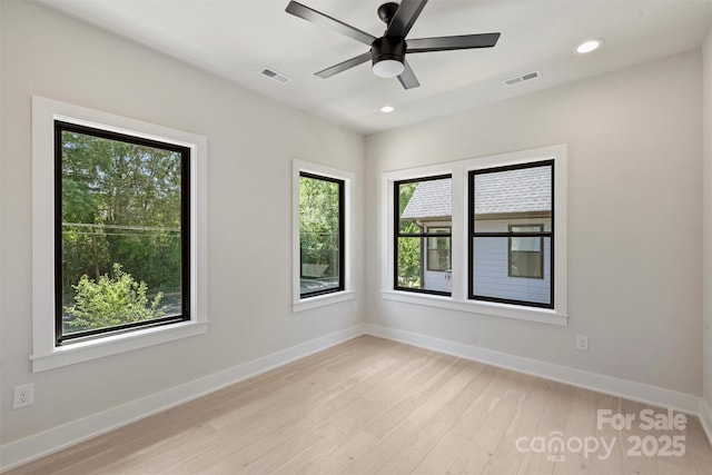 unfurnished room with light wood-type flooring, baseboards, recessed lighting, and a ceiling fan