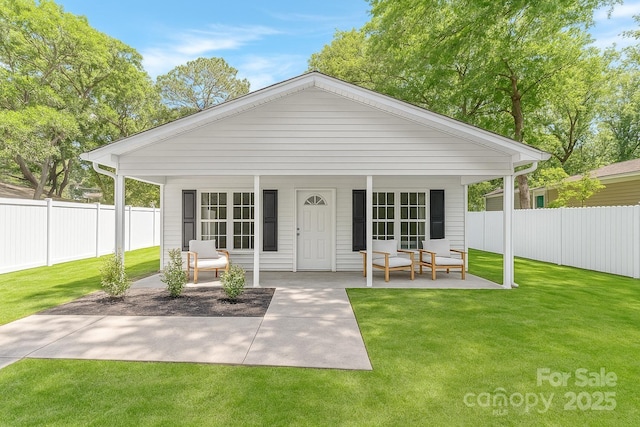 rear view of property with covered porch
