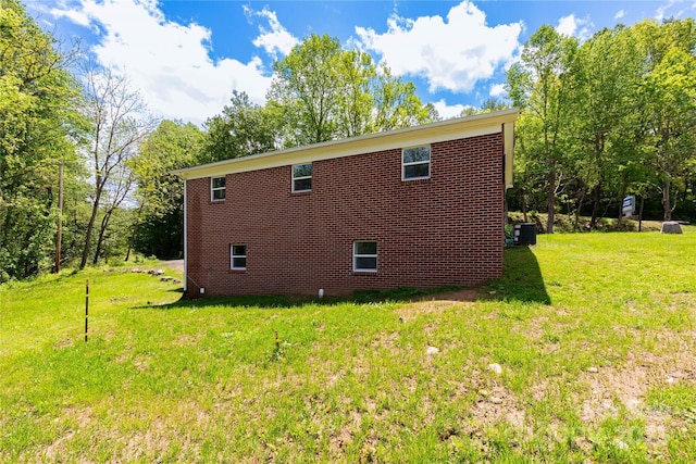 1318 Crawford Rd, Waynesville, NC 28785 - view of property exterior featuring a yard
