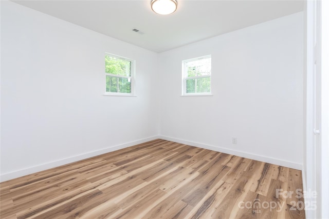 1318 Crawford Rd, Waynesville, NC 28785 - unfurnished room with light wood-style floors and baseboards