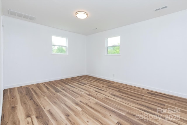1318 Crawford Rd, Waynesville, NC 28785 - empty room with baseboards and light wood finished floors