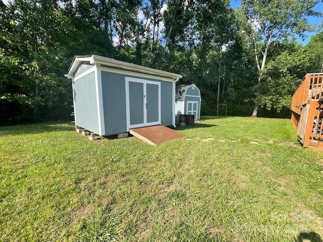 517 Grassy Creek Run, Chester, SC 29706 - view of shed with view of wooded area