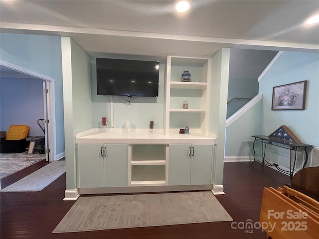517 Grassy Creek Run, Chester, SC 29706 - bar featuring dark wood-style floors, baseboards, built in shelves, and stairs