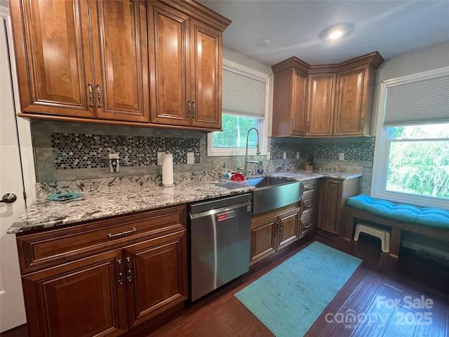 517 Grassy Creek Run, Chester, SC 29706 - kitchen with dishwasher, dark wood finished floors, tasteful backsplash, a sink, and light stone counters