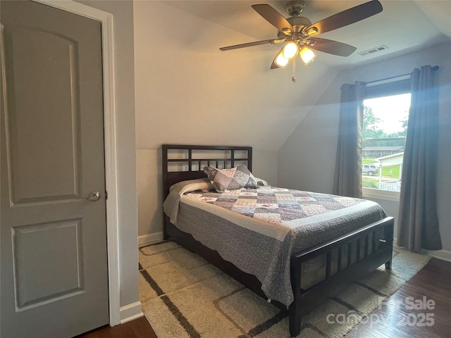 517 Grassy Creek Run, Chester, SC 29706 - bedroom featuring vaulted ceiling, dark wood-style floors, baseboards, and a ceiling fan