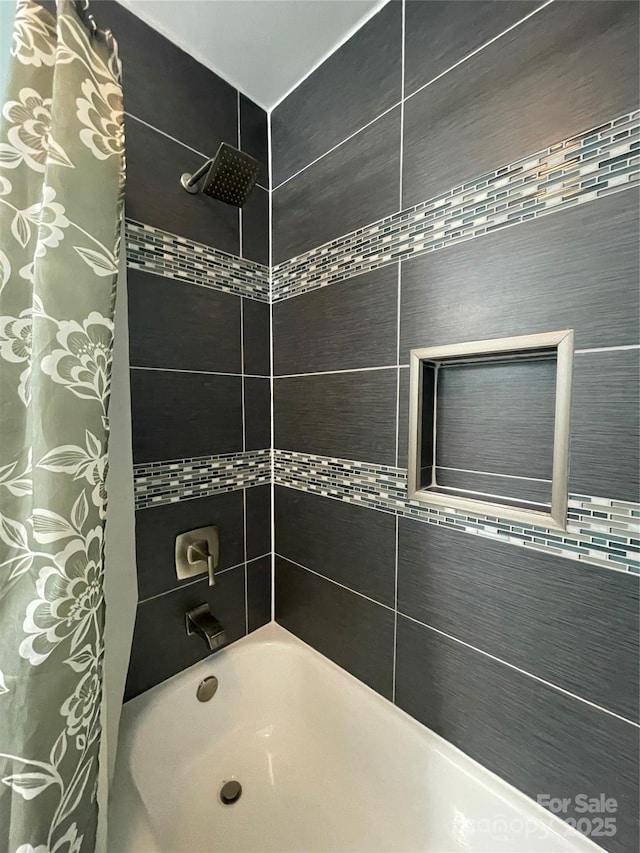 517 Grassy Creek Run, Chester, SC 29706 - bathroom featuring shower / bathtub combination with curtain