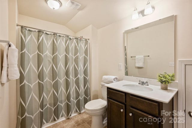 bathroom with toilet, vanity, lofted ceiling, and a shower with curtain