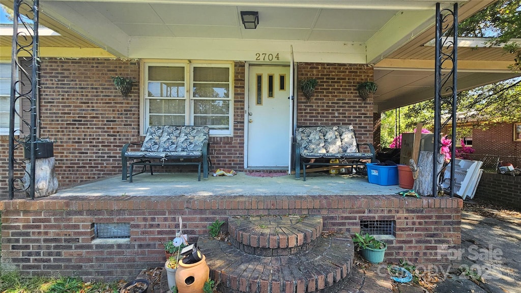 2704 Chambers St, Lumberton, NC 28358 - view of patio featuring covered porch