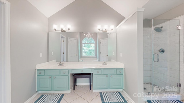 full bathroom featuring a shower stall, tile patterned floors, double vanity, lofted ceiling, and baseboards