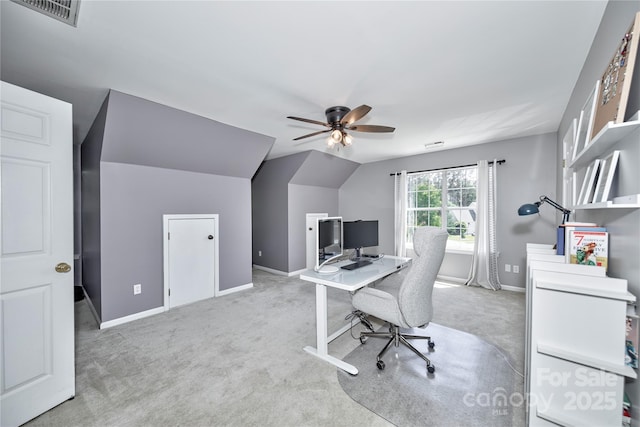 carpeted office featuring a ceiling fan, baseboards, and lofted ceiling