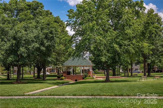 view of community with a gazebo and a yard
