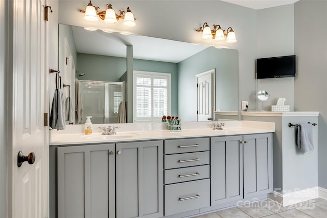 208 Mcduffie Ln, Fort Mill, SC 29715 - bathroom with a shower stall, double vanity, and tile patterned flooring