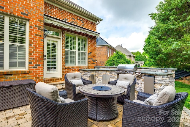 208 Mcduffie Ln, Fort Mill, SC 29715 - deck featuring grilling area, an outdoor kitchen, and a patio area
