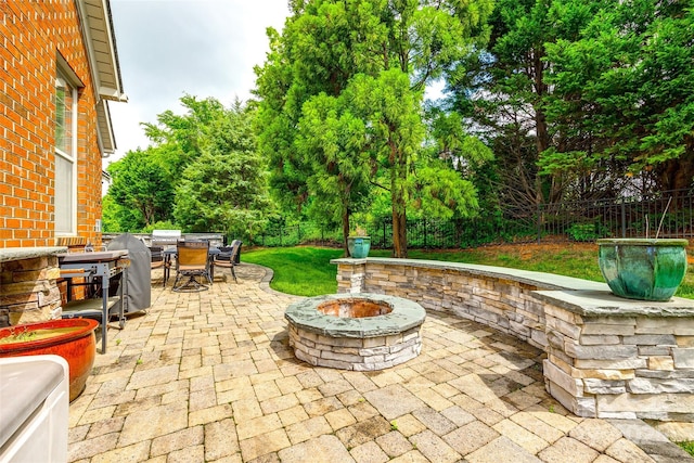 208 Mcduffie Ln, Fort Mill, SC 29715 - view of patio with outdoor dining area, a fire pit, and a fenced backyard