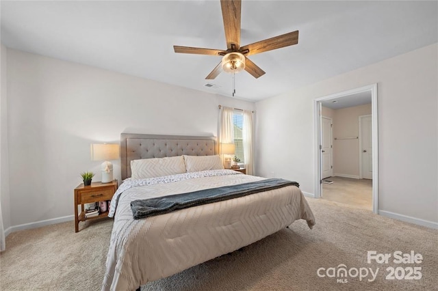 bedroom with carpet floors, baseboards, and a ceiling fan
