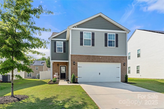 446 Misty Law Ln, Clover, SC 29710 - view of front facade featuring brick siding, driveway, a front lawn, and a garage