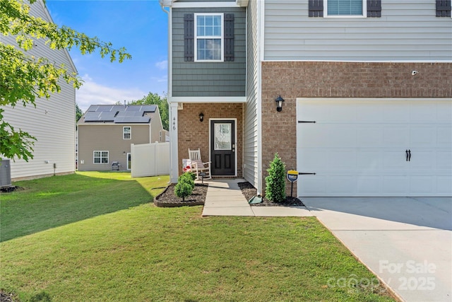 446 Misty Law Ln, Clover, SC 29710 - view of front of home with brick siding, concrete driveway, and an attached garage