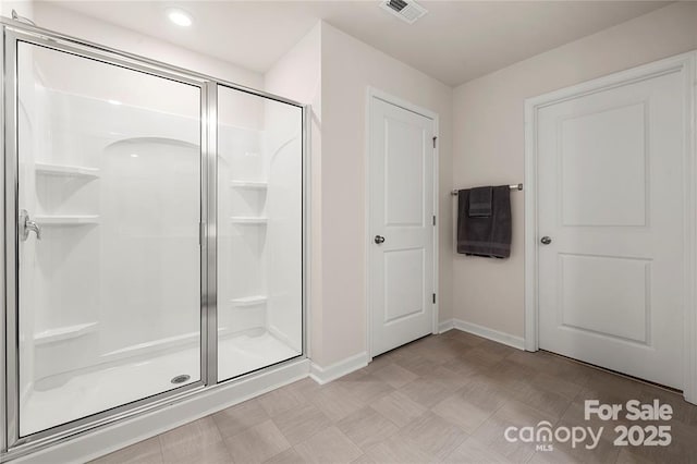 446 Misty Law Ln, Clover, SC 29710 - bathroom with a stall shower, tile patterned floors, and recessed lighting