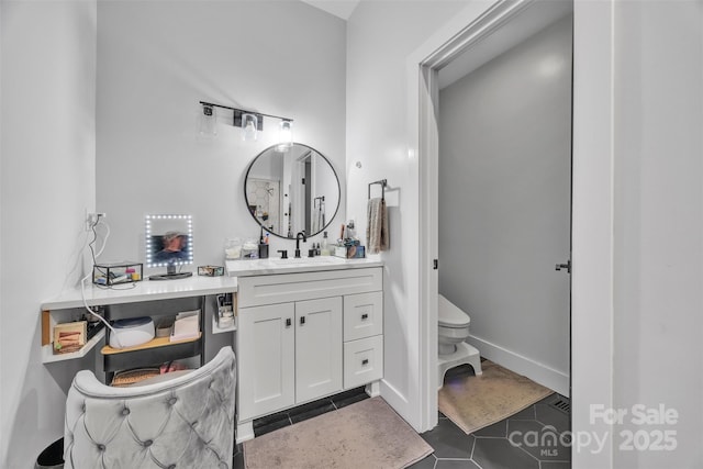 5262 Mckenzie Trl, Conover, NC 28613 - bathroom featuring toilet, vanity, and tile patterned floors