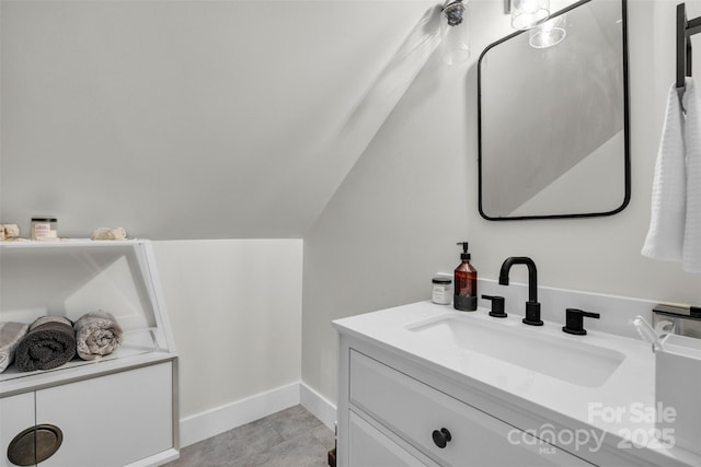 5262 Mckenzie Trl, Conover, NC 28613 - bathroom with vanity, baseboards, tile patterned flooring, and lofted ceiling