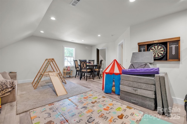 5262 Mckenzie Trl, Conover, NC 28613 - playroom with recessed lighting, wood finished floors, baseboards, and lofted ceiling