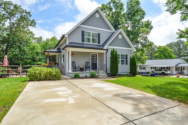 8024 Eagle St, Mount Pleasant, NC 28124 - view of front of house featuring a porch, a standing seam roof, and metal roof