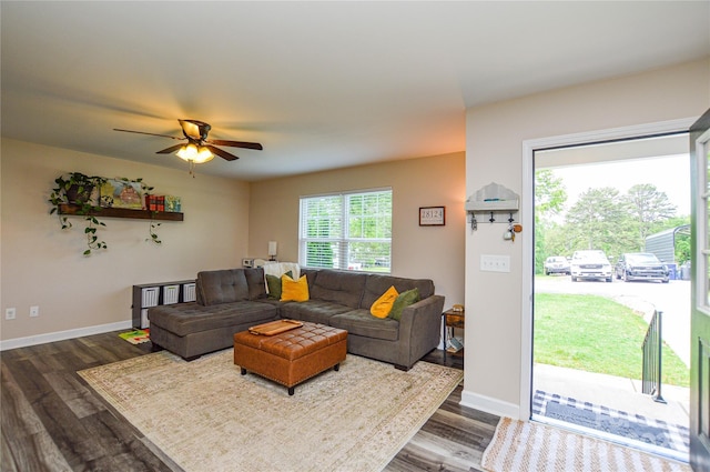 8024 Eagle St, Mount Pleasant, NC 28124 - living area featuring dark wood finished floors, a ceiling fan, and baseboards