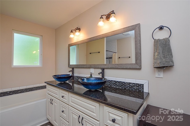 8024 Eagle St, Mount Pleasant, NC 28124 - bathroom with double vanity and a bathtub