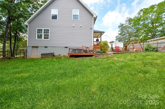 8024 Eagle St, Mount Pleasant, NC 28124 - back of house with a deck, crawl space, and a playground