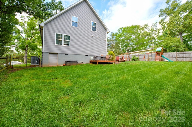 8024 Eagle St, Mount Pleasant, NC 28124 - rear view of house with a playground