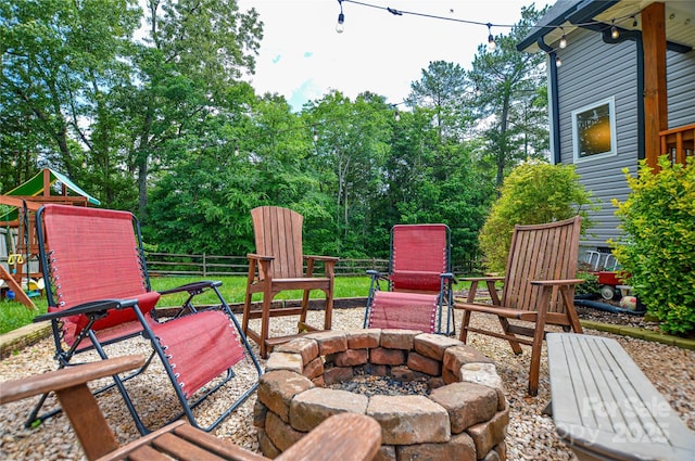 8024 Eagle St, Mount Pleasant, NC 28124 - wooden deck with an outdoor fire pit and a playground