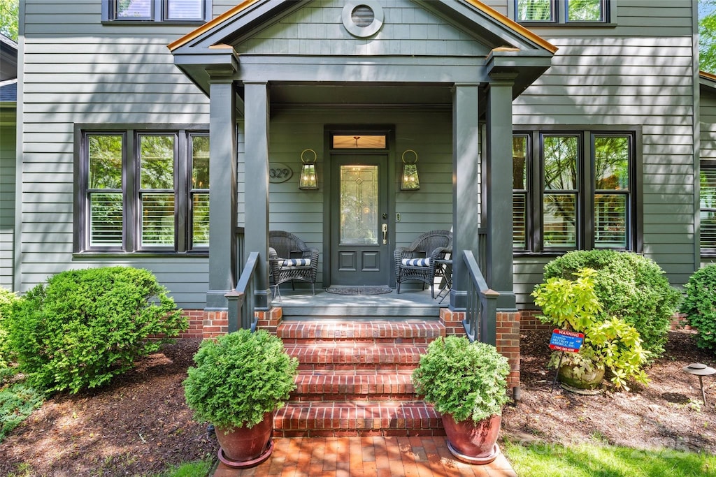 2329 Club Rd, Charlotte, NC 28205 - property entrance featuring a porch