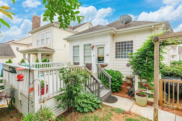 view of front of property with a deck