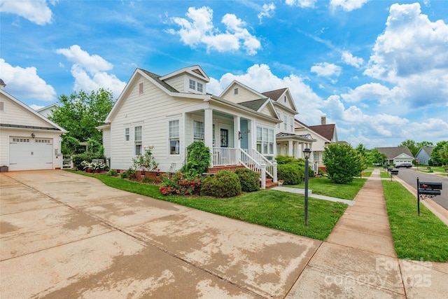 view of front of home featuring a garage, a front lawn, covered porch, and driveway