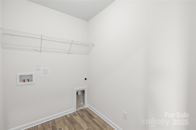 2322 Joes Lake Rd, Shelby, NC 28152 - laundry area featuring washer hookup, dark wood-type flooring, electric dryer hookup, and baseboards