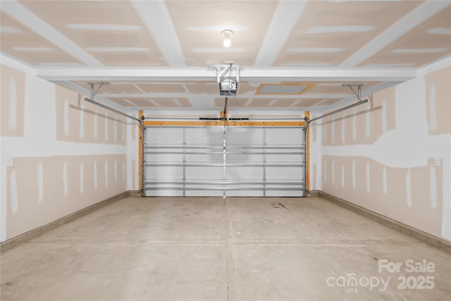 2322 Joes Lake Rd, Shelby, NC 28152 - garage featuring a garage door opener and baseboards