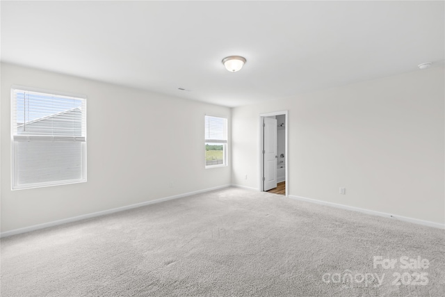 2322 Joes Lake Rd, Shelby, NC 28152 - carpeted empty room with baseboards and a smoke detector