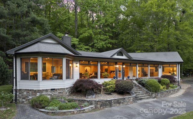 451 Pacolet Pond Ln, Tryon, NC 28782 - back of house featuring a chimney, a porch, and a shingled roof