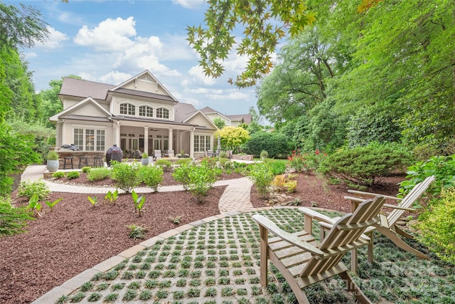 6831 Conservatory Ln, Charlotte, NC 28210 - back of property featuring a patio area, stucco siding, and a ceiling fan