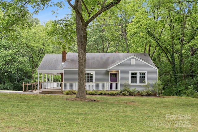500 Peigler St NW Unit 1 & 2, Concord, NC 28027 - view of front of house featuring a chimney, covered porch, and a front yard