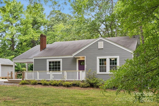 500 Peigler St NW Unit 1 & 2, Concord, NC 28027 - ranch-style home with a chimney, a front yard, and a shingled roof