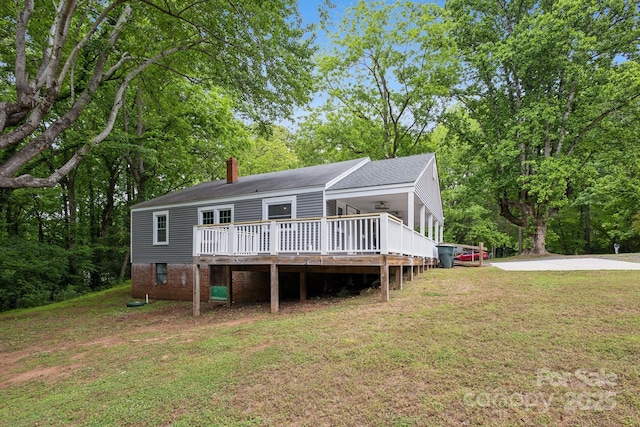 500 Peigler St NW Unit 1 & 2, Concord, NC 28027 - view of front of property featuring a front yard, a chimney, a deck, and roof with shingles