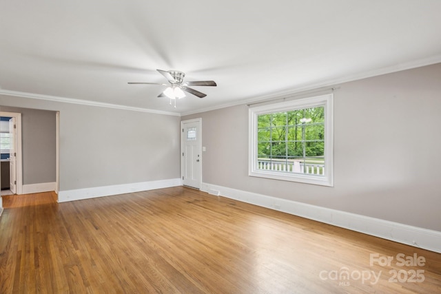500 Peigler St NW Unit 1 & 2, Concord, NC 28027 - unfurnished room featuring ceiling fan, wood finished floors, crown molding, and baseboards