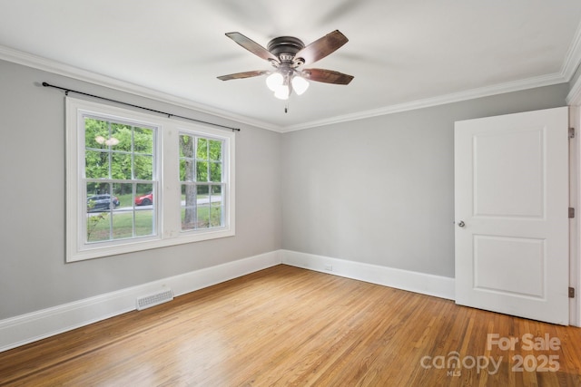 500 Peigler St NW Unit 1 & 2, Concord, NC 28027 - unfurnished room featuring baseboards, light wood-type flooring, ceiling fan, and crown molding