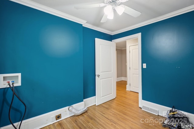 500 Peigler St NW Unit 1 & 2, Concord, NC 28027 - empty room featuring a ceiling fan, wood finished floors, baseboards, and ornamental molding