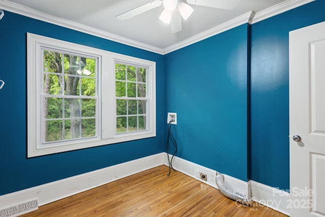 500 Peigler St NW Unit 1 & 2, Concord, NC 28027 - unfurnished room with ceiling fan, wood finished floors, crown molding, and baseboards