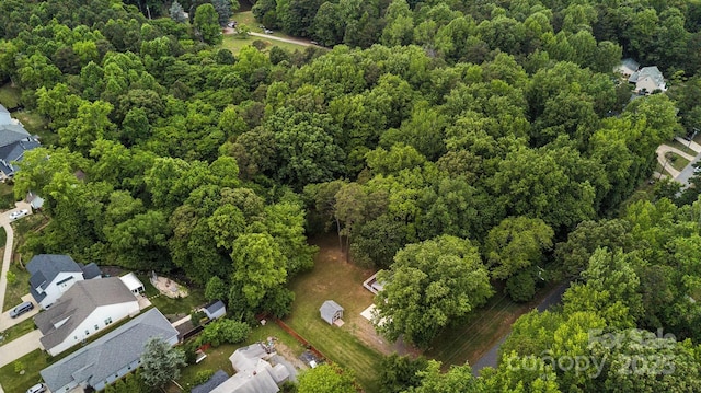 500 Peigler St NW Unit 1 & 2, Concord, NC 28027 - aerial view of property and surrounding area featuring a forest and nearby suburban area