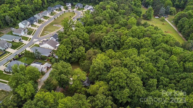 500 Peigler St NW Unit 1 & 2, Concord, NC 28027 - aerial overview of property's location featuring nearby suburban area and a forest